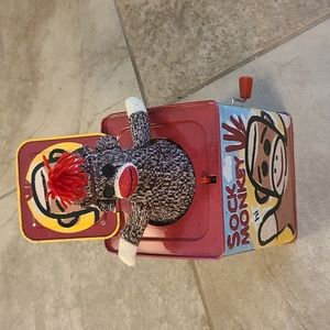 2010 Schylling Sock Monkey, windup toy